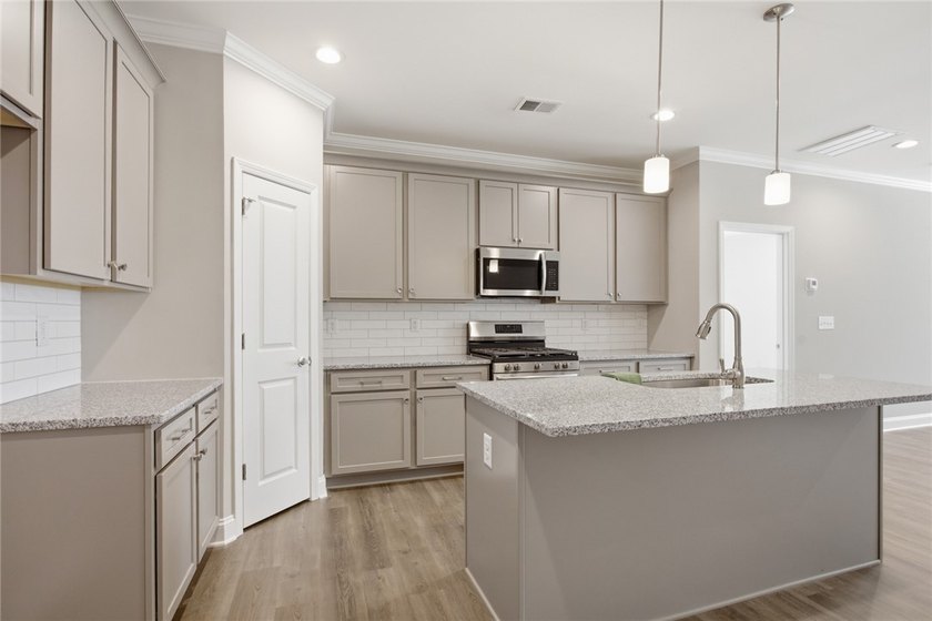 Discover unparalleled convenience and modern elegance in this - photo 11