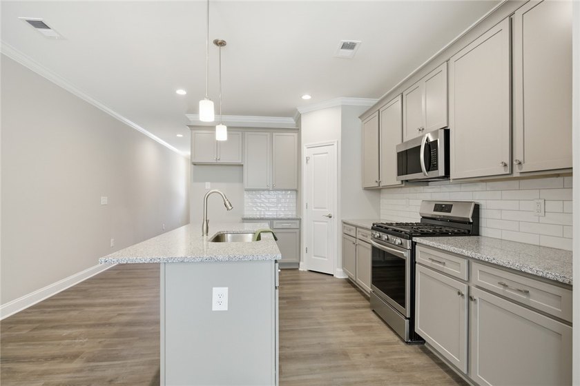 Discover unparalleled convenience and modern elegance in this - photo 12