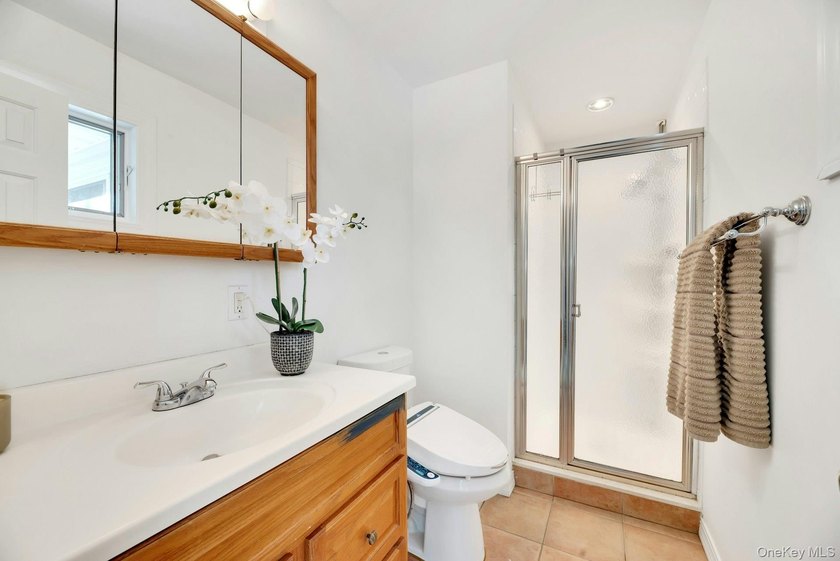 Nestled in the highly sought-after Tiana Shores enclave of - photo 17