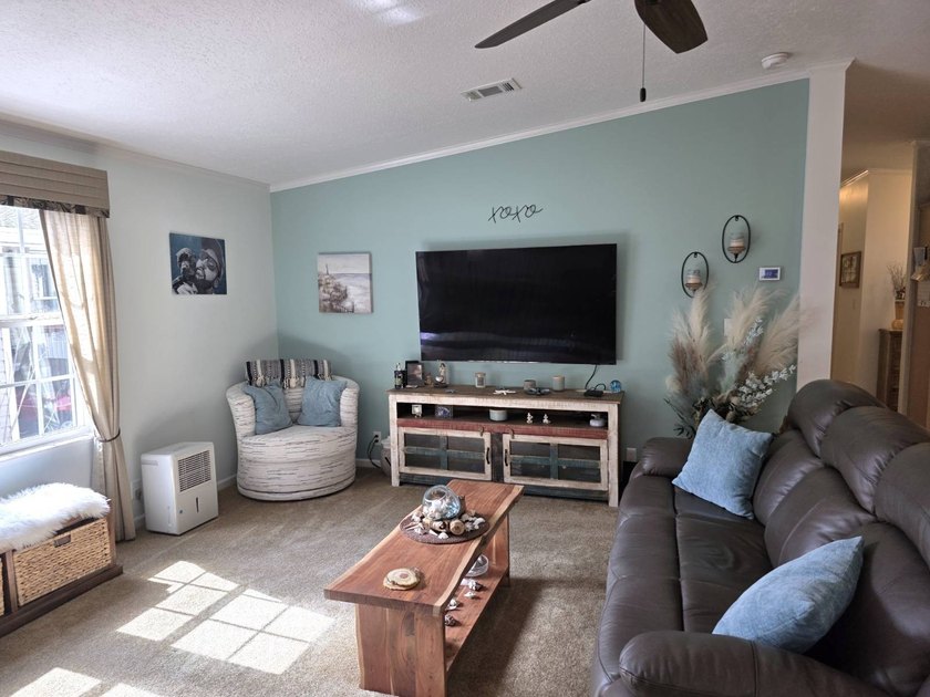 THIS HOME IS ON LEASED LAND WITH A MONTHLY LOT RENT OF $517 AND - photo 31