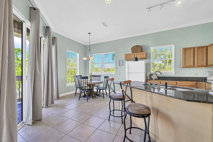 This fully furnished 2 bedroom 2 bath condo is tucked away in - photo 6