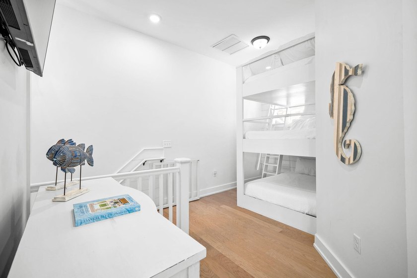 Sleeping up to 10 guests, 62 Charming Way offers two bedrooms - photo 13