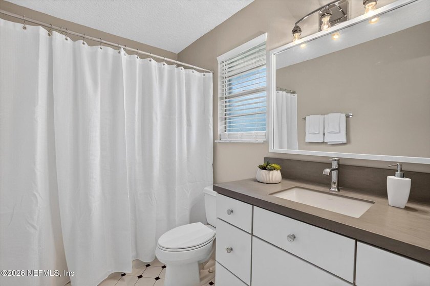 Welcome to 8620 San Servera Drive W, a beautifully updated - photo 29