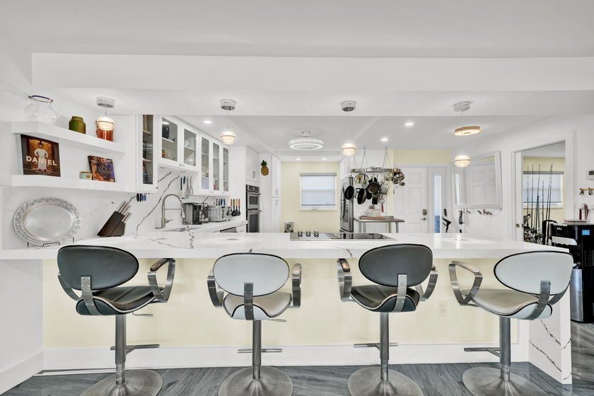 One of the finest three-bedroom waterfront residences in - photo 10