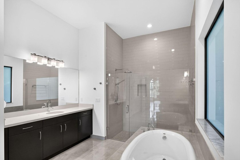 Welcome to luxury living in the prestigious, gated enclave of - photo 14