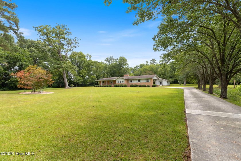 Tucked quietly away from the road at 312 N Mitchell Ford Rd in - photo 38