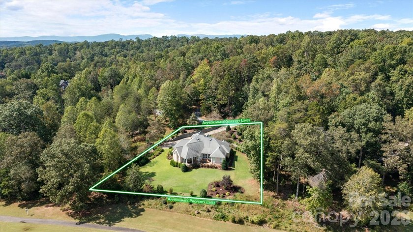 This stunning home overlooks the 17th green at Cleghorn Golf - photo 4