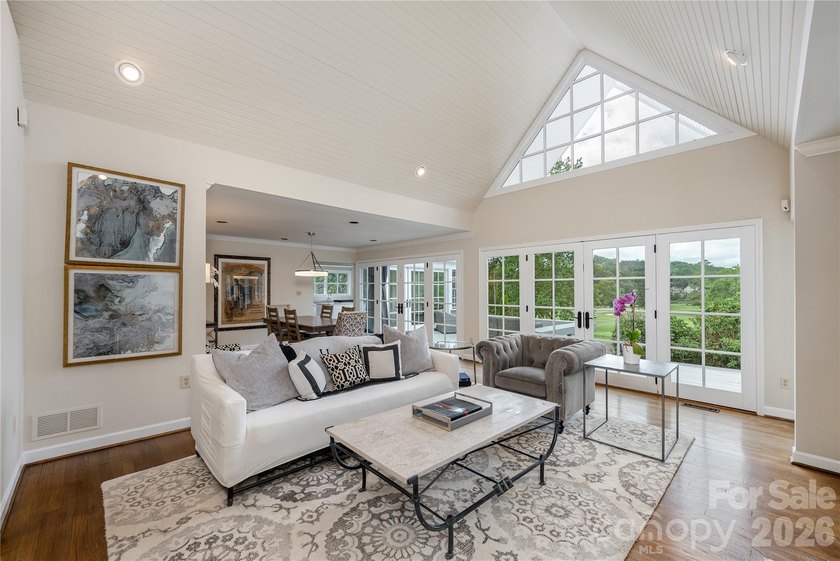Set on a private .7-acre lot in North Asheville, this 3-bedroom - photo 7