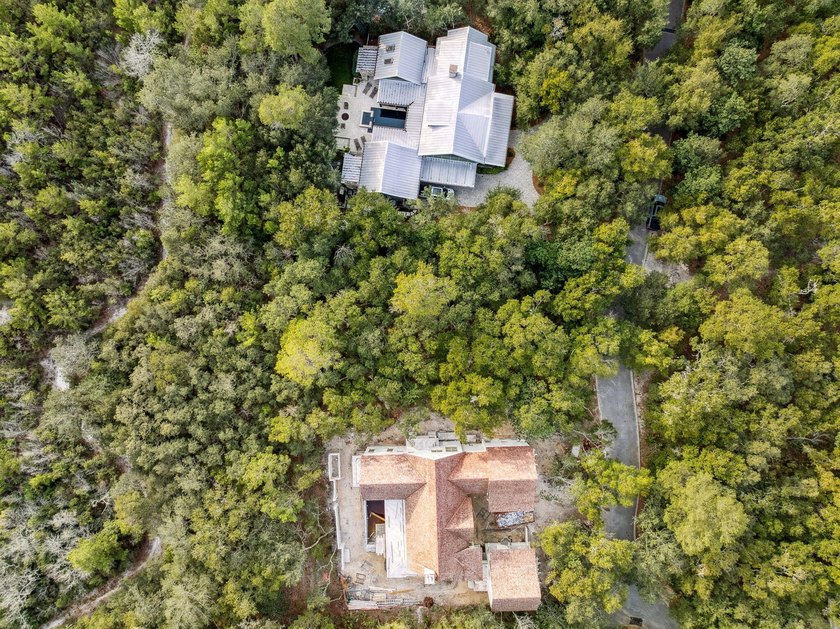 This exceptional 0.33-acre homesite offers bay views within the - photo 8