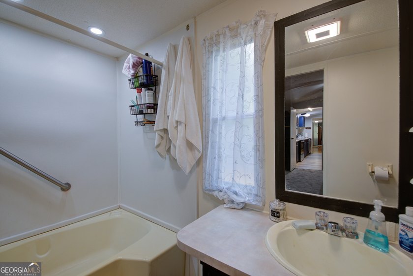 Looking for a private 2-bedroom home on acreage with no HOA? - photo 7