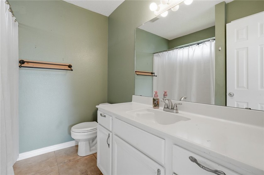 Spacious 4-Bedroom Home- Prime Location. Ideally situated just - photo 16