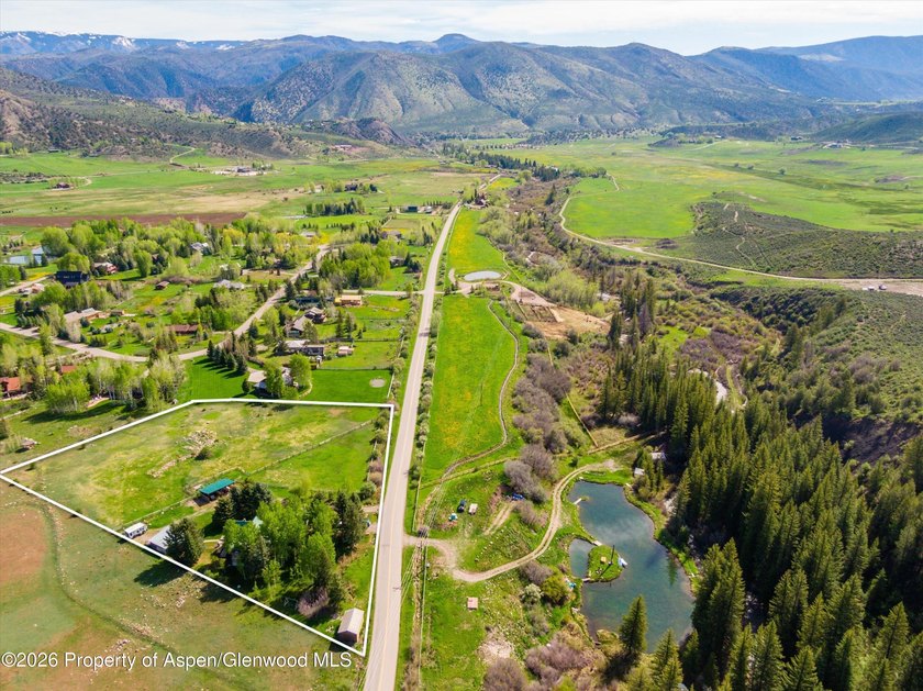Set in the heart of the Roaring Fork Valley, this extraordinary - photo 2