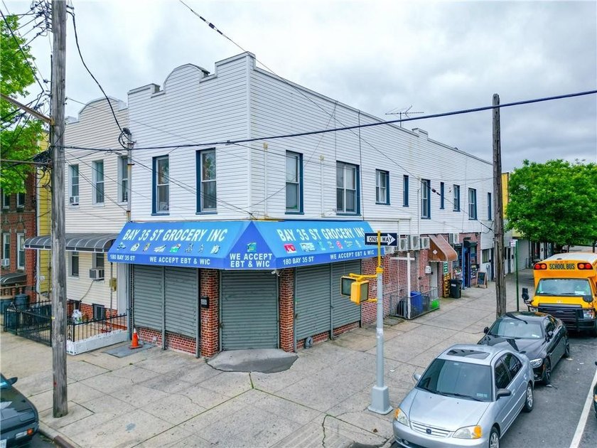 Presenting a well-maintained corner mixed-use building situated - photo 4