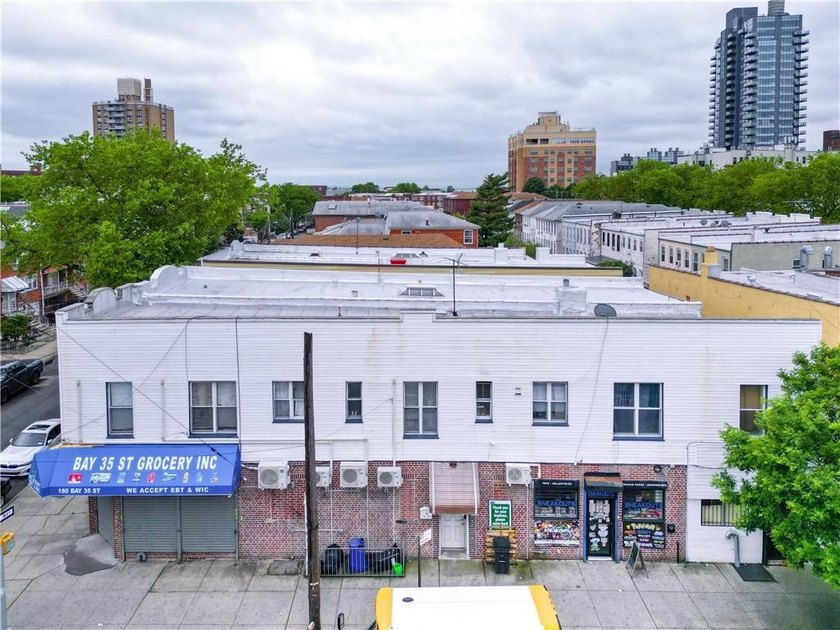 Presenting a well-maintained corner mixed-use building situated - photo 6