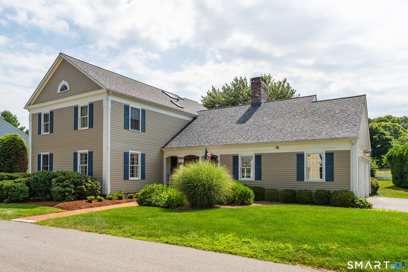 Set on a peaceful cul-de-sac in Madison's highly desirable - photo 2