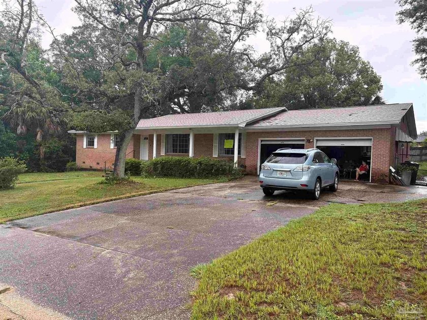This single family residence is in need of some TLC. The owner - photo 2