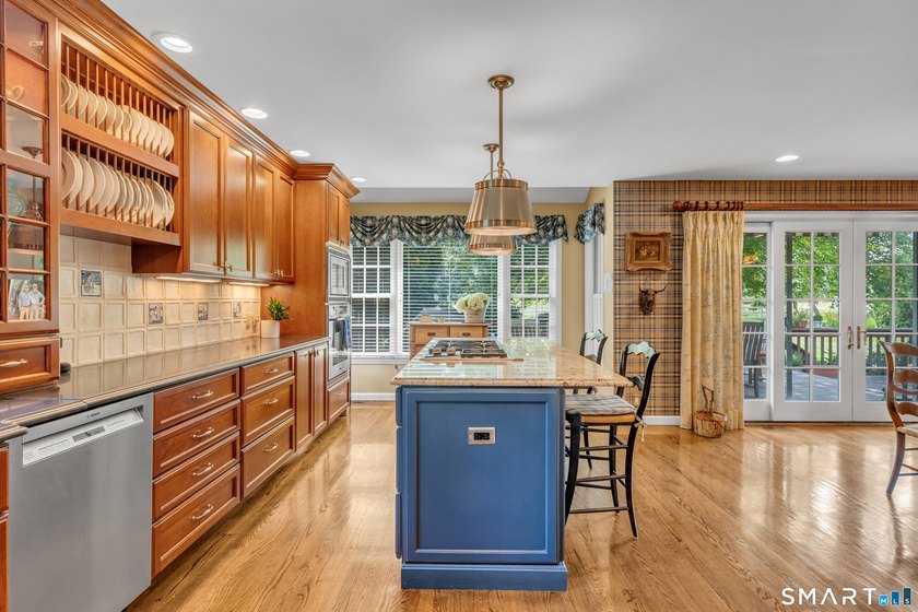 Set on a peaceful cul-de-sac in Madison's highly desirable - photo 8