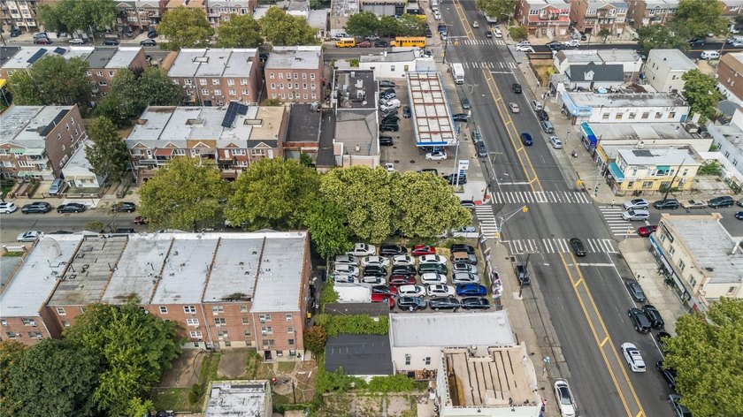 This 5,400 sq ft vacant lot offers a rare chance to build up to - photo 4
