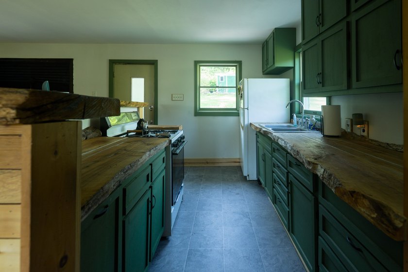 Welcome to your own retreat! Nestled on 1.25 wooded acres in - photo 8