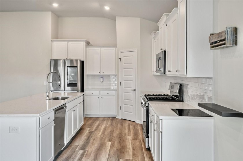 Welcome to 974 Arrowwood Way, a beautifully crafted home in the - photo 11