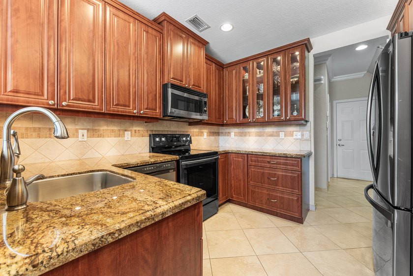 Come see this corner unit in the Fairways, a super quiet, gated - photo 13