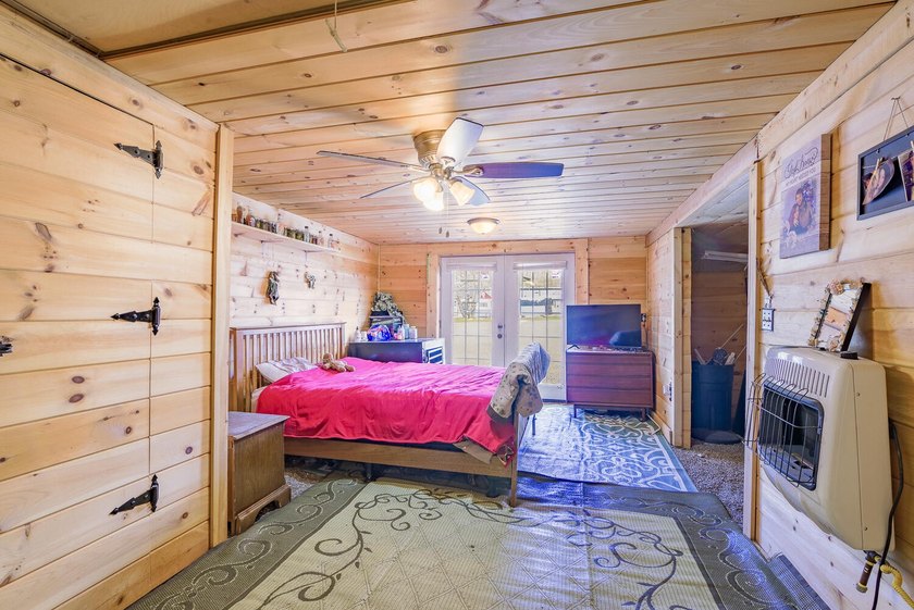 Set on nearly 2 private acres in Freedom, Maine, this unique - photo 33