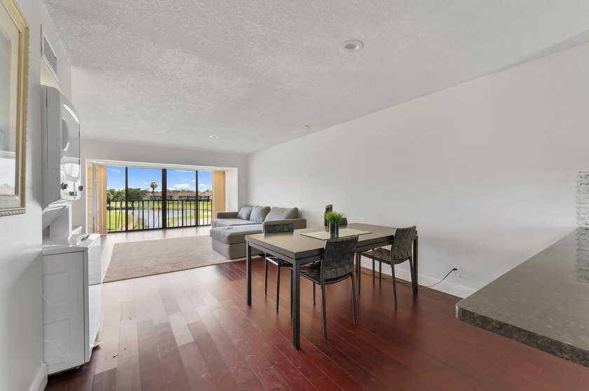 Wake up to tranquil lake and golf course views in this - photo 9