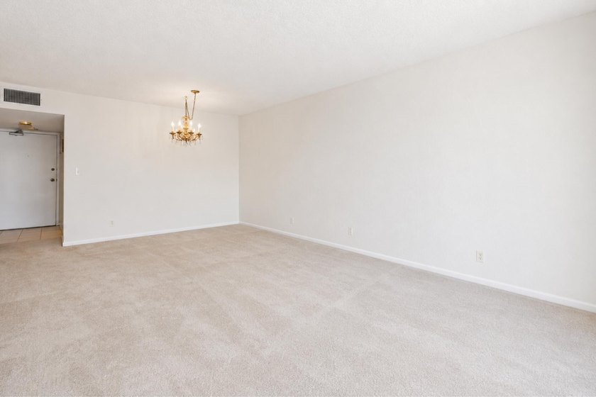 Virtually Staged. Wake up to breathtaking panoramic water views - photo 14