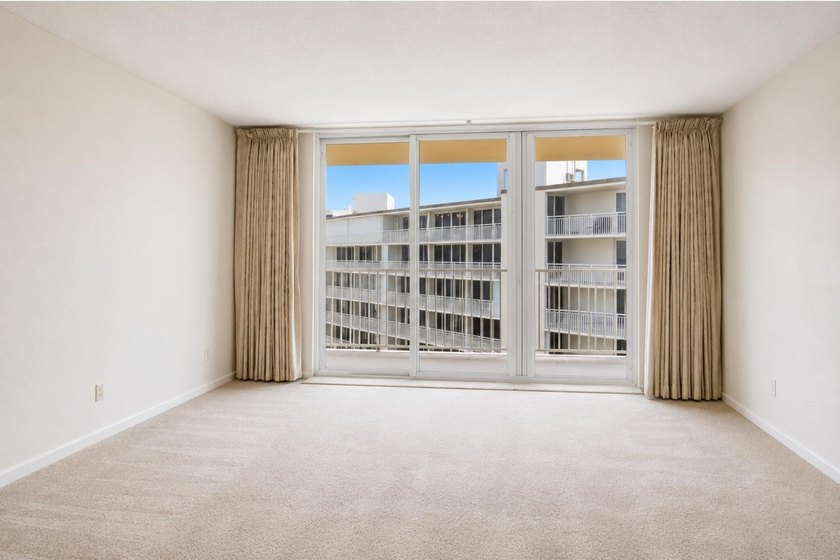 Virtually Staged. Wake up to breathtaking panoramic water views - photo 16