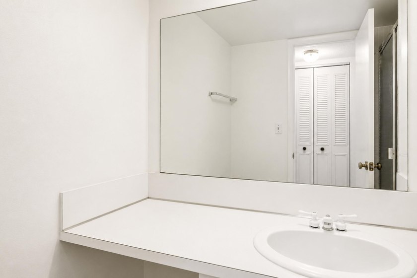 Virtually Staged. Wake up to breathtaking panoramic water views - photo 18