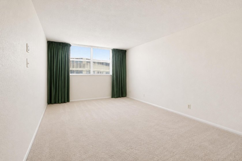 Virtually Staged. Wake up to breathtaking panoramic water views - photo 20