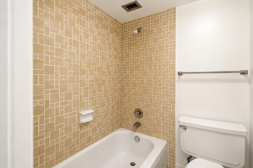 Virtually Staged. Wake up to breathtaking panoramic water views - photo 24