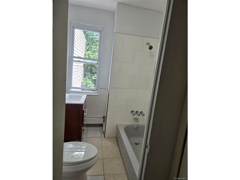 Welcome to this beautifully maintained attached one-family home - photo 11