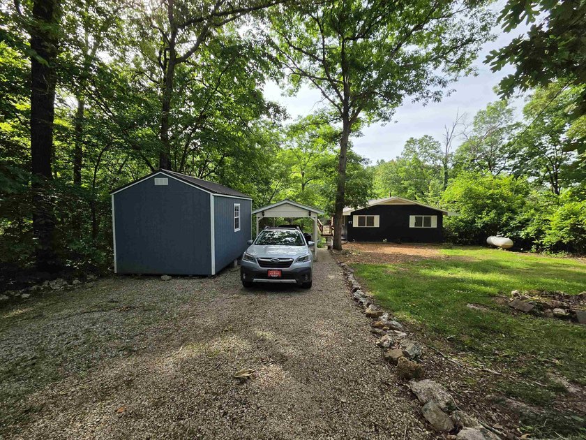Lake Vagabond home with wraparound deck and patio. Privacy - photo 35