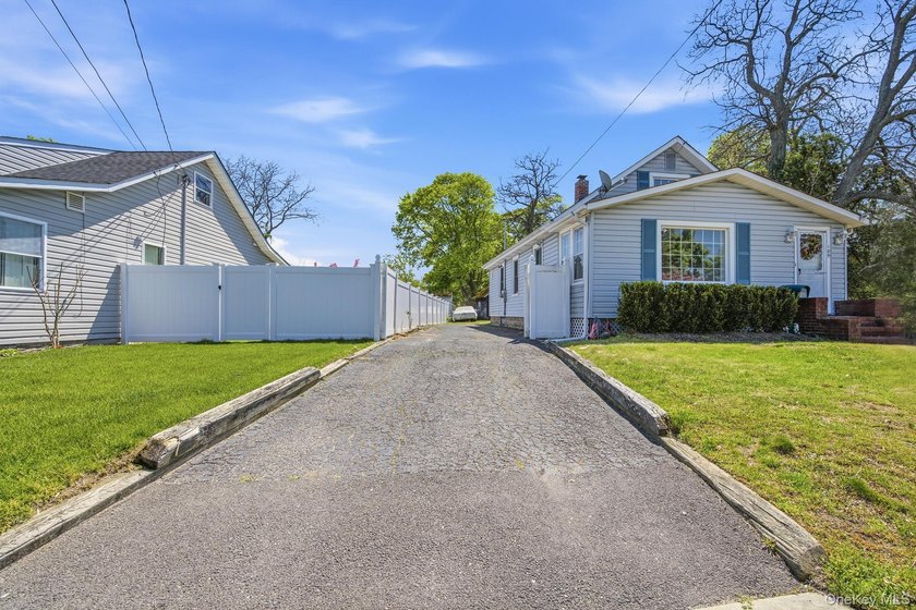 Welcome to 109 Grove Avenue, a 3-bedroom, 1-bath ranch set on a - photo 3