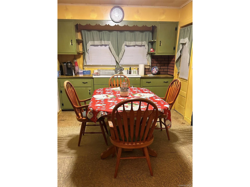 Welcome to 109 Grove Avenue, a 3-bedroom, 1-bath ranch set on a - photo 4