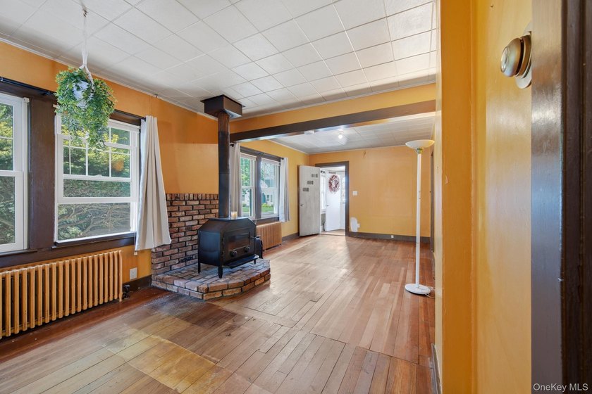 Welcome to 109 Grove Avenue, a 3-bedroom, 1-bath ranch set on a - photo 6