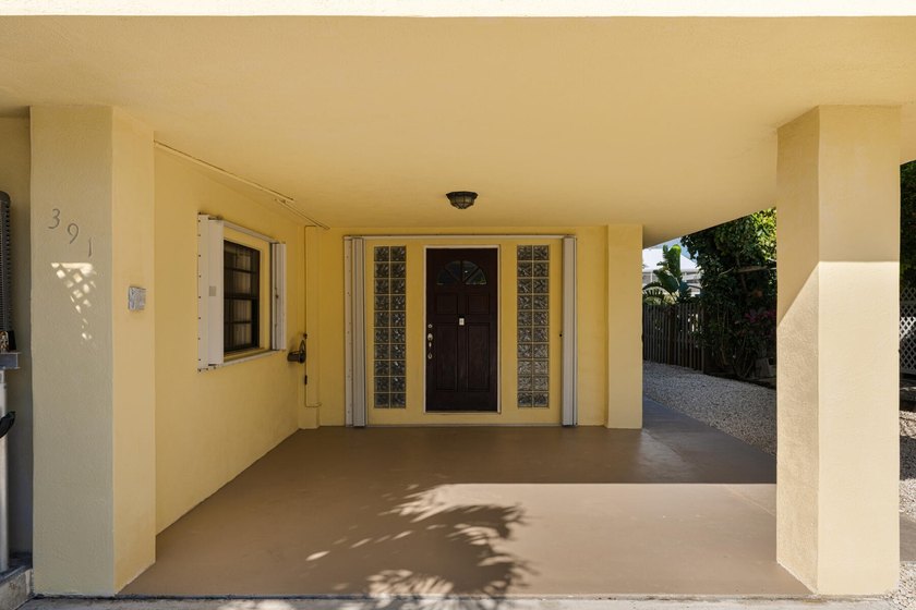 Discover exceptional waterfront living in the heart of Key - photo 11