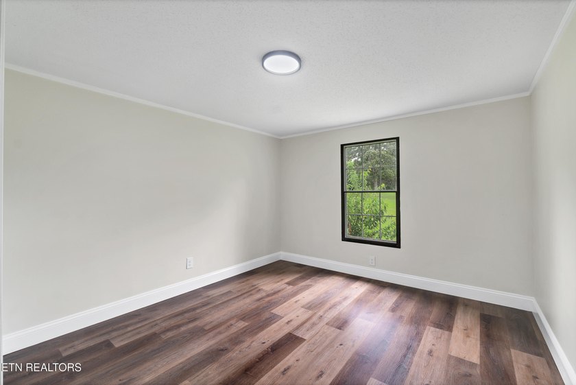Completely remodeled inside and out, this move-in ready home on - photo 21