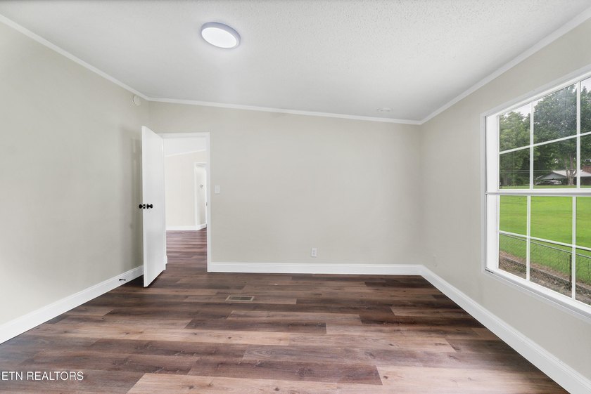 Completely remodeled inside and out, this move-in ready home on - photo 24