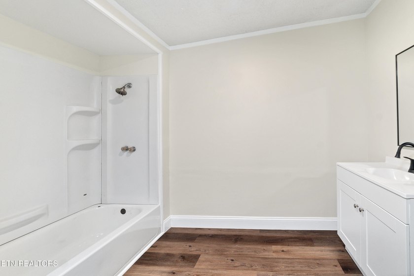 Completely remodeled inside and out, this move-in ready home on - photo 25