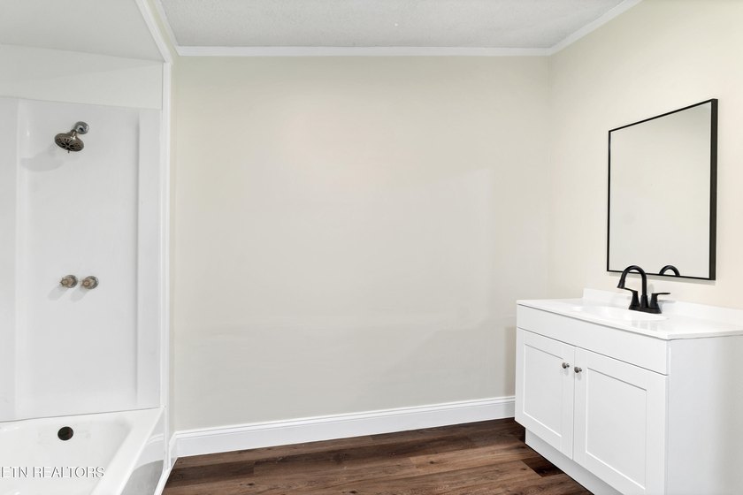 Completely remodeled inside and out, this move-in ready home on - photo 27