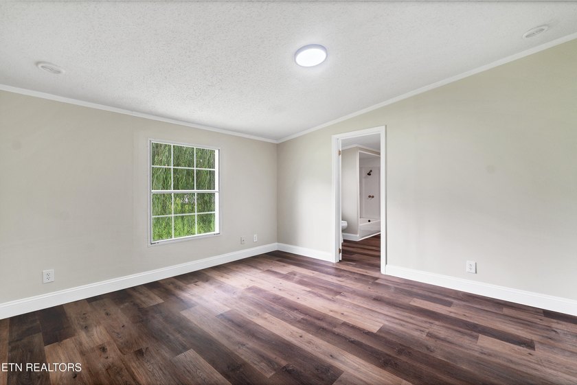 Completely remodeled inside and out, this move-in ready home on - photo 30