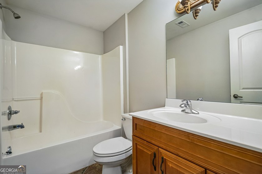 Lake Lanier convenience without the high price tag! Nestled on a - photo 22