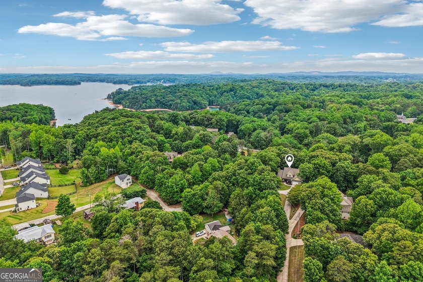 Lake Lanier convenience without the high price tag! Nestled on a - photo 32