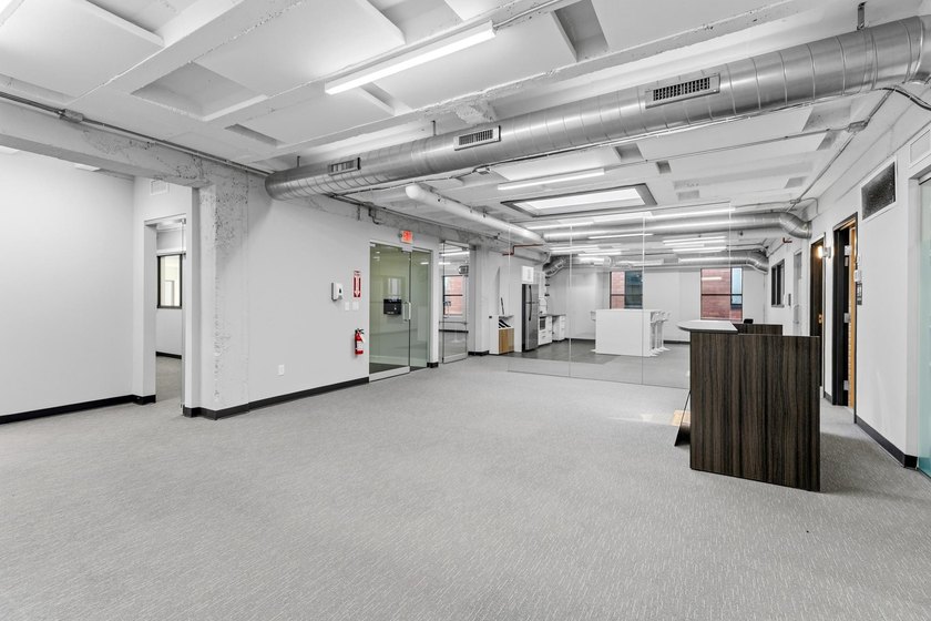 - 15,120 SF: 2 Levels with 21 parking spaces in rear lot - photo 8