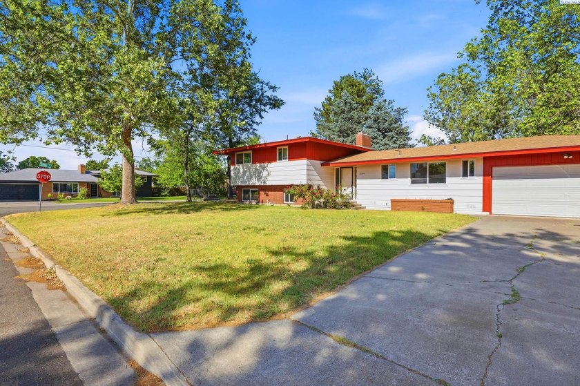 MLS# 293334 This well-located 4-bedroom home offers convenience - photo 2