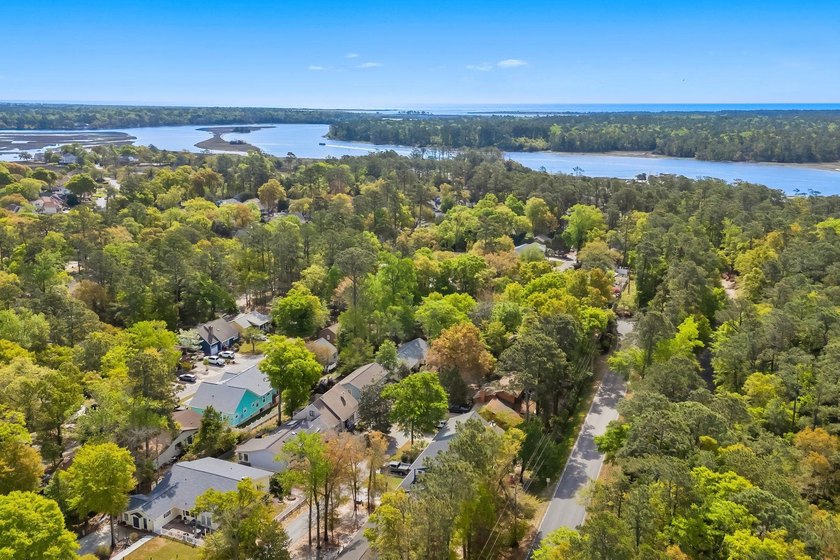 Tucked beneath a canopy of mature trees in the desirable - photo 51