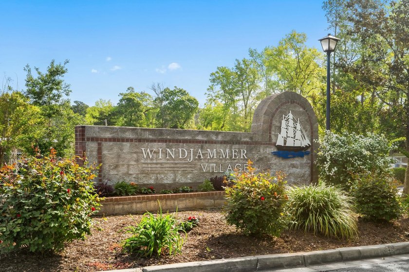 Tucked beneath a canopy of mature trees in the desirable - photo 60