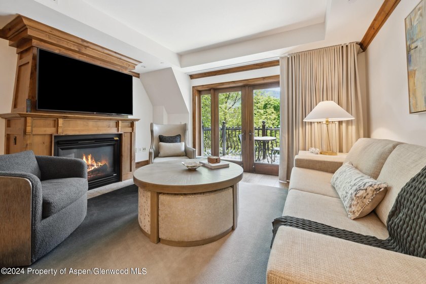 The Aspen Mountain Residences is nestled at the base of the - photo 2